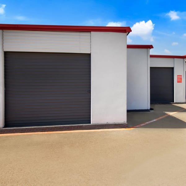 Outdoor drive-up storage units at StorQuest Economy Self Storage in Mesquite, Texas