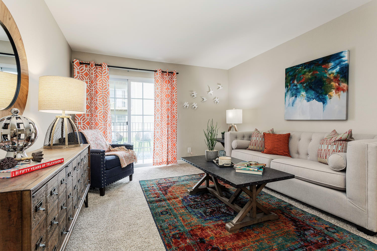 Well-decorated model living room at Jackson Grove Apartment Homes in Hermitage, Tennessee