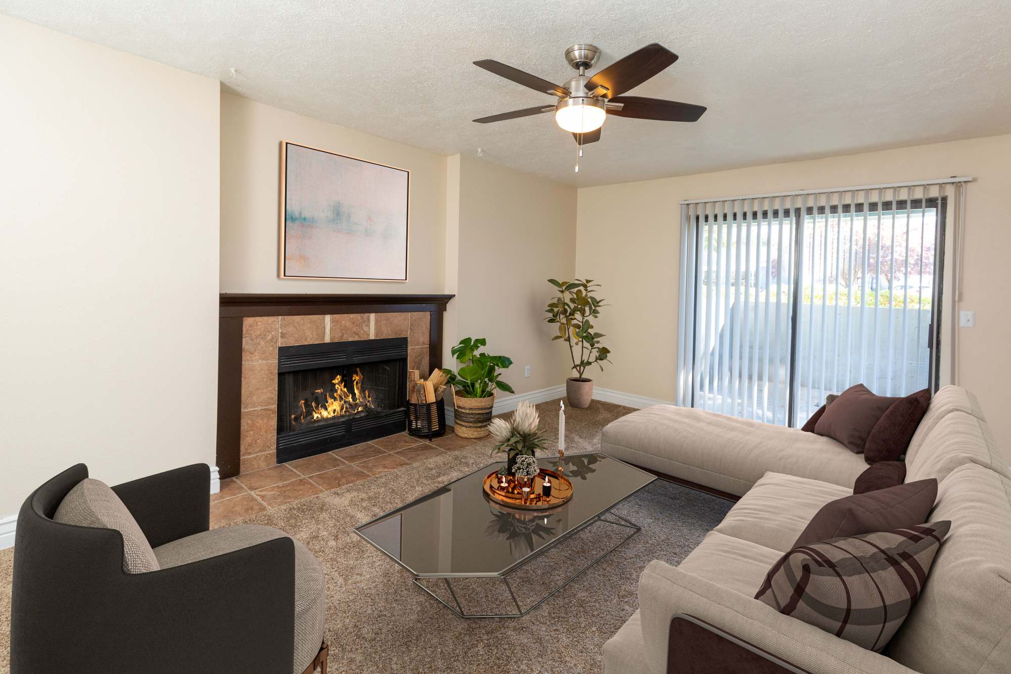 Living room with fireplace at Royal Ridge Apartments in Midvale, Utah