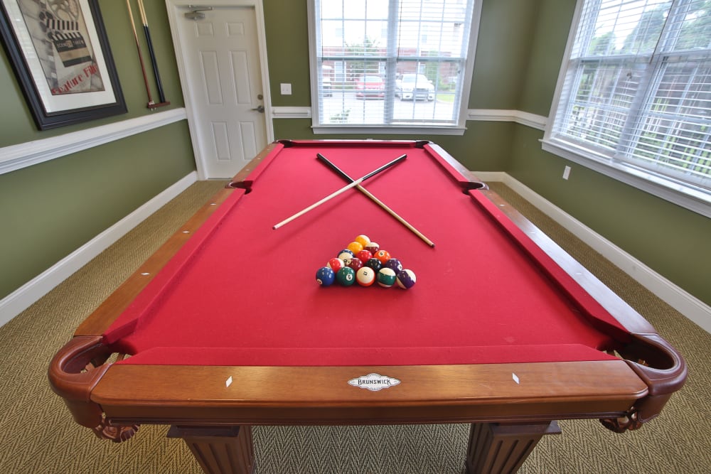 Clubhouse game room and pool table at The Heights at McArthur Park in Fayetteville, North Carolina