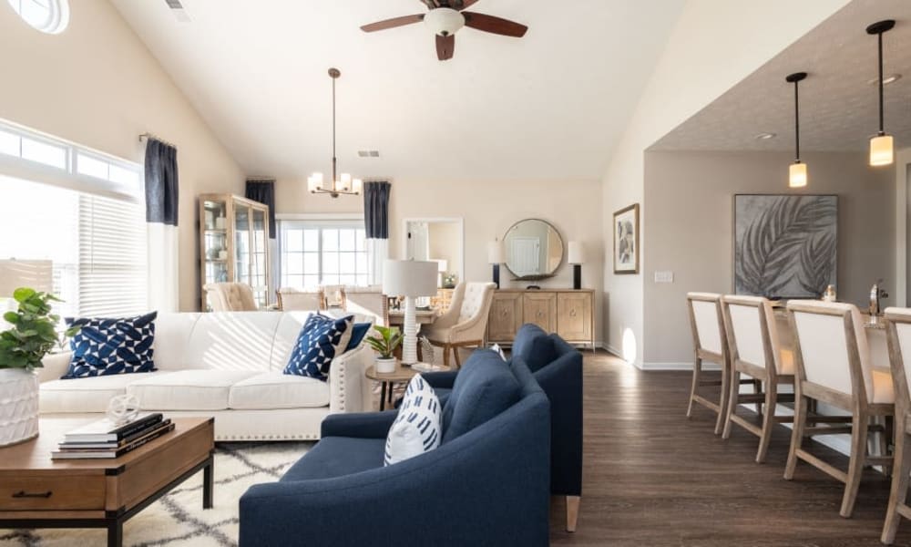 Community clubroom with a bar and high ceilings at Randall Residence of Centerville in Centerville, Ohio