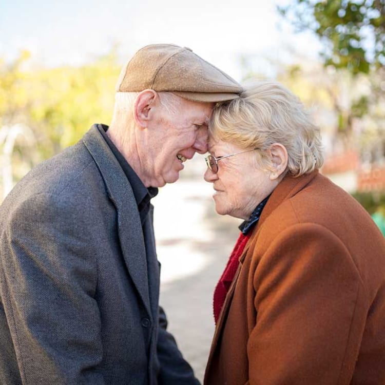 Couple sharing a meaningful moment together at Arcadia Senior Living Pace in Pace, Florida