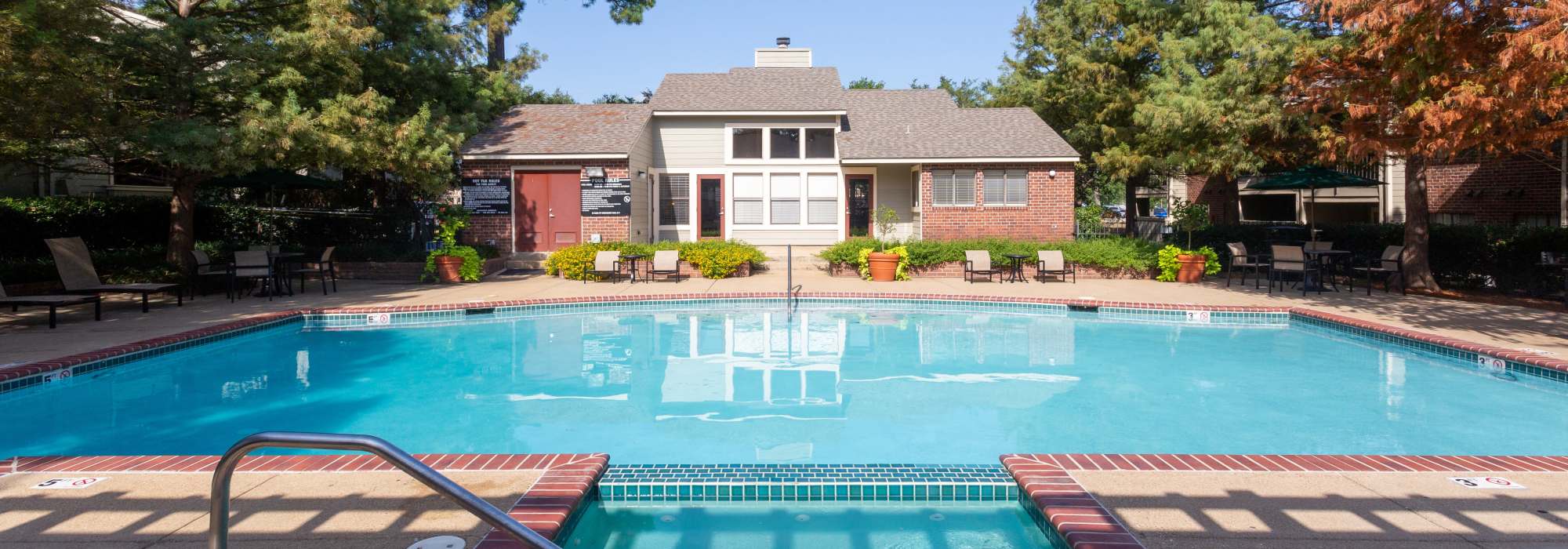 Sparkling pool with lounge chairs at Southwood Village in Shreveport, Louisiana