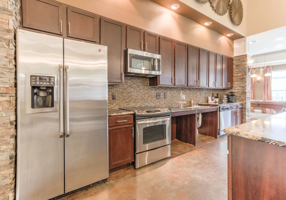 Stainless steel appliance kitchen in clubhouse at Amberton at Stonewater in Cary, North Carolina