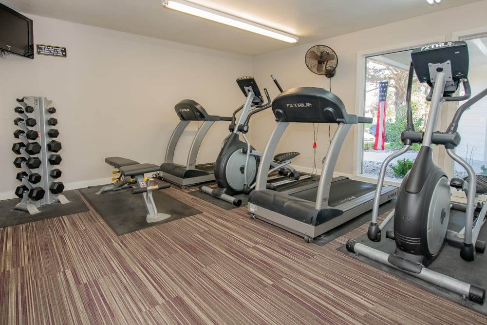 Well equipped fitness center at Aspen Park Apartments in Wichita, Kansas