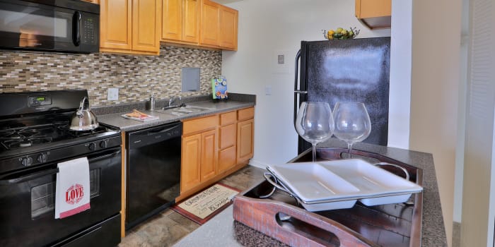 Well equipped kitchen at Kings Park Plaza Apartment Homes in Hyattsville, Maryland