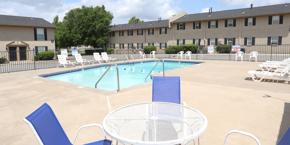 Seating next to the pool at Sterling Park in Norman, Oklahoma