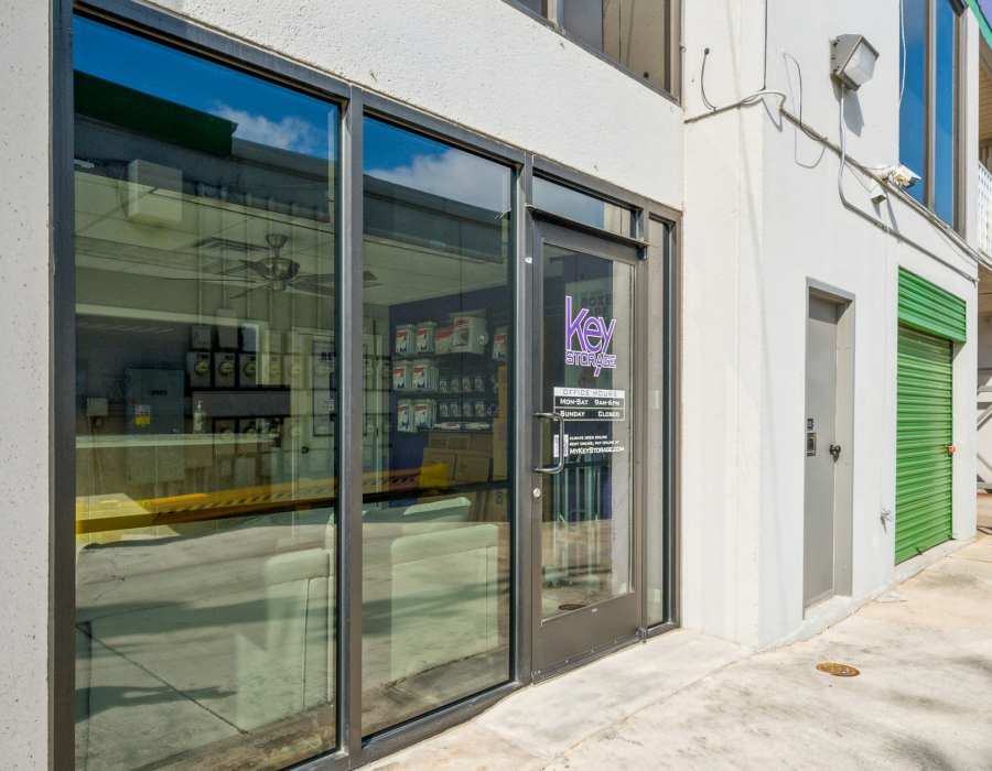 Modern storage facility entrance with large glass windows at Storage Hub - Grissom in San Antonio, Texas
