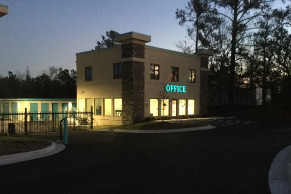 The front of Cardinal Self Storage - Wilmington at night in Wilmington, North Carolina