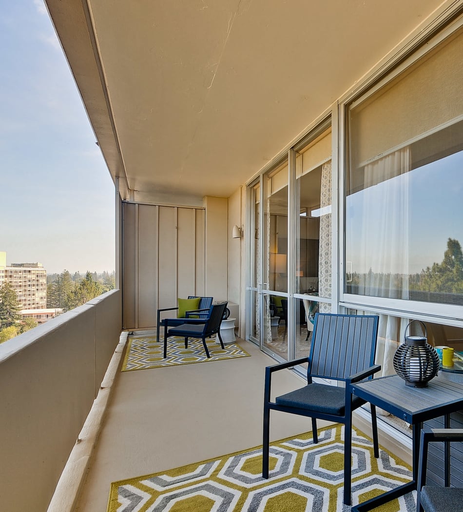 Spacious balconies with treeline views at The Marc, Palo Alto in Palo Alto, California