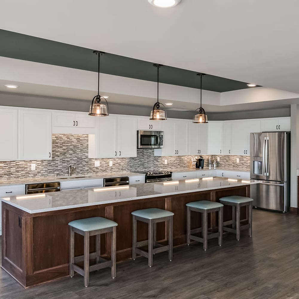 Community kitchen at Applewood Pointe of Champlin at Mississippi Crossings in Champlin, Minnesota. 