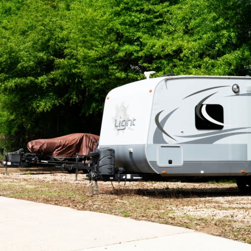 Outdoor RV and automobile parking at Red Dot Storage in Denham Springs, Louisiana