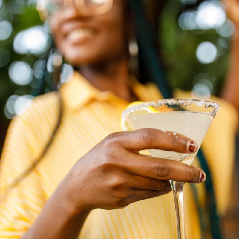 A resident enjoys a cocktail near Messenger Place, Manassas, Virginia