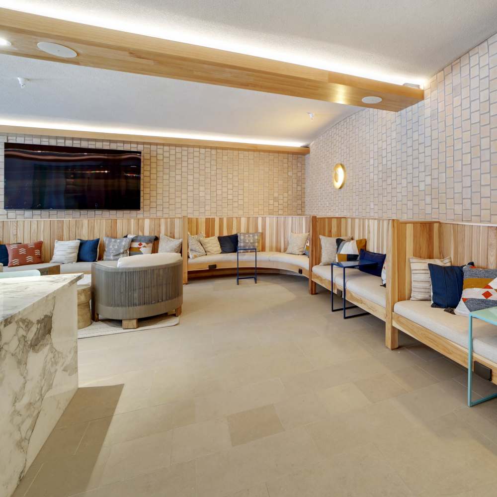 Spacious clubhouse with ample amount of sitting area at Lydian in Phoenix,Arizona