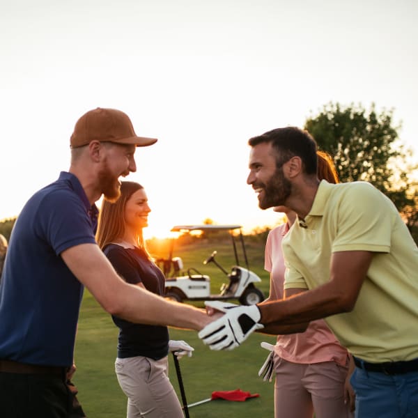 Residents playing golf near Cedar Park & Canyon Falls Townhomes in Twin Falls, Idaho