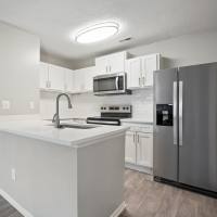 Modern island kitchen at Niner Woods in Charlotte, North Carolina