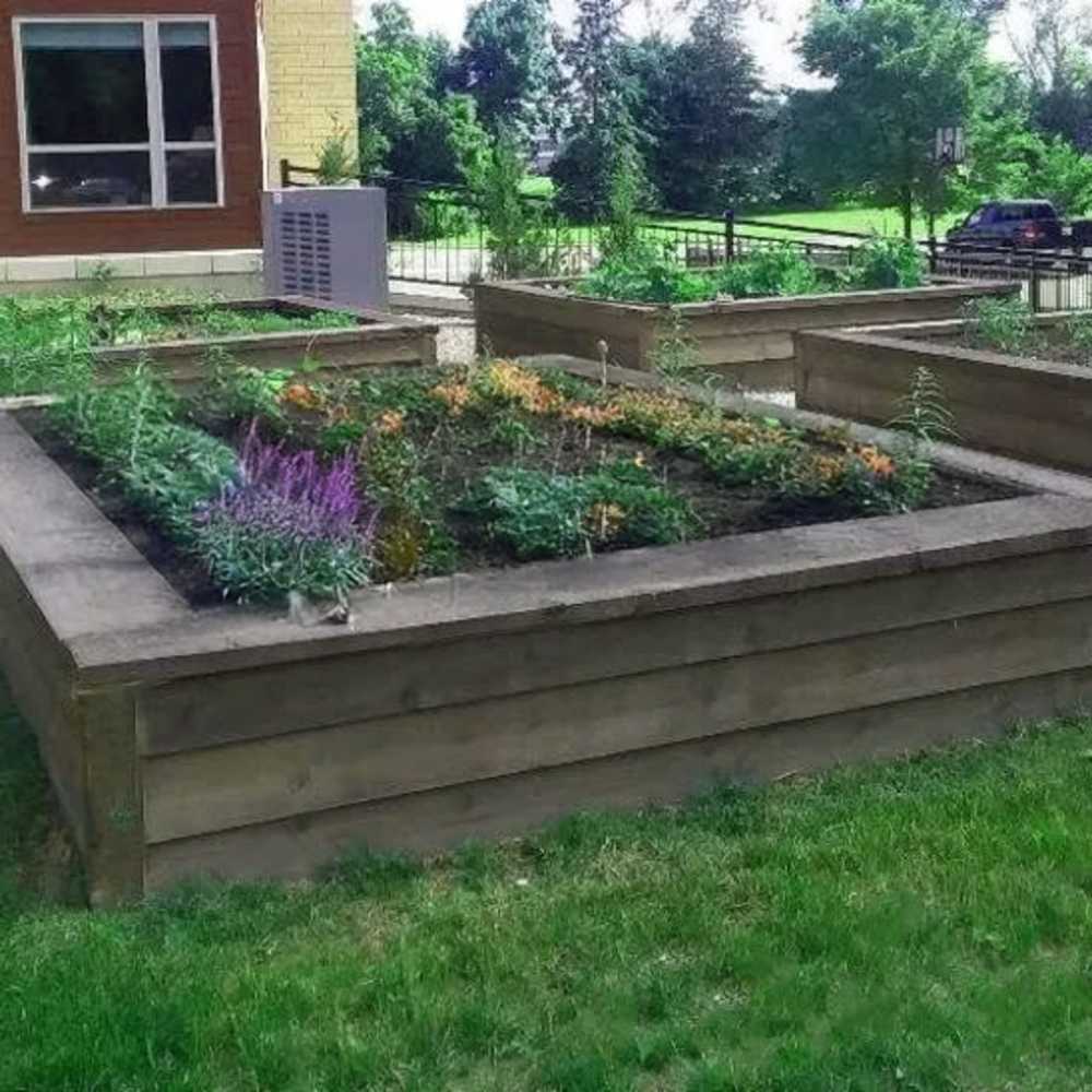 Outdoor Garden Bed area at Novation Senior Commons in Madison, Wisconsin