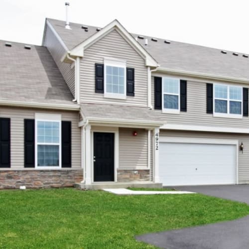 Home with an attached garage at The Manors at Brookmere in Matteson, Illinois