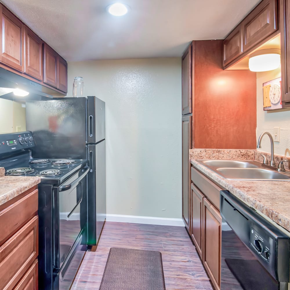 Kitchen area in unit of Napoleon Square Apartments in Houston, Texas