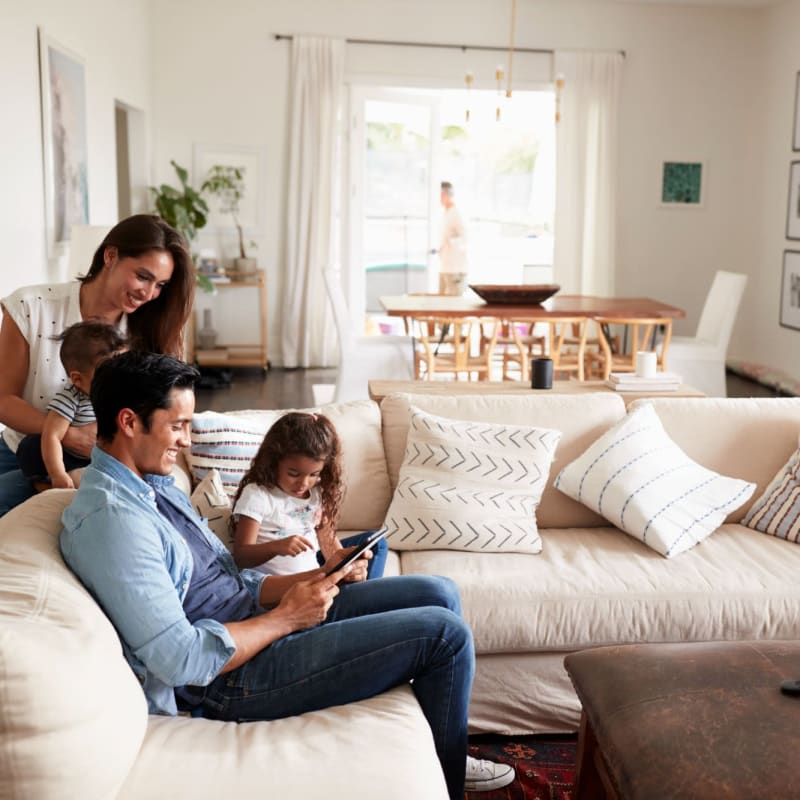 A family spends time together in their apartment at Attain at Bradford Creek, Huntsville, Alabama