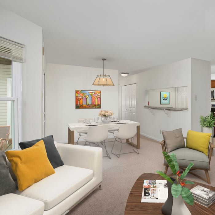 Modern living room and dining area at Gateway Village Apartments in Jessup, MD