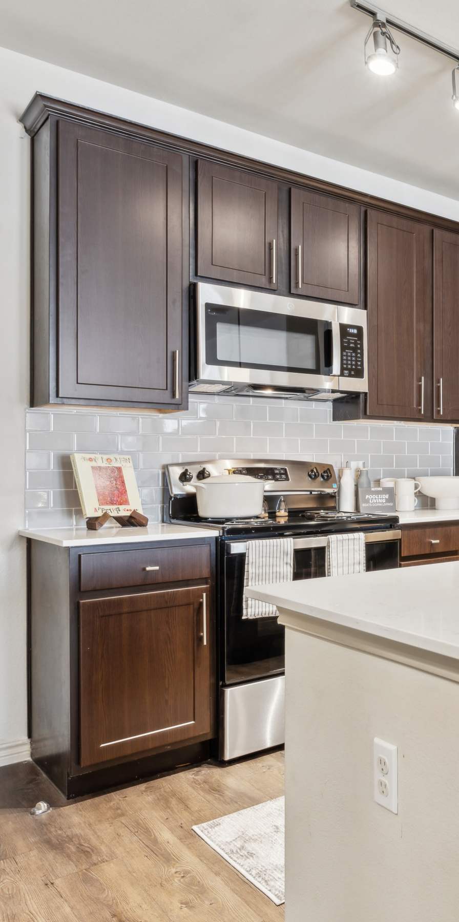 Modern kitchen in a model student apartment at Midtown 905 in Denton, Texas