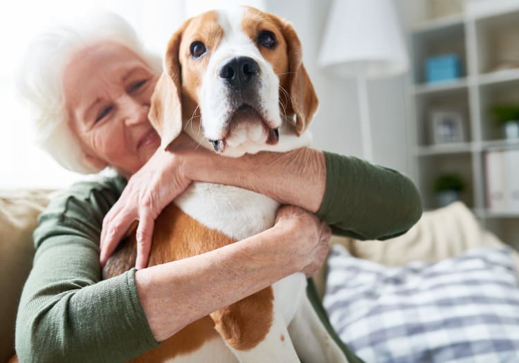 Senior and her dog at MBK Senior Living