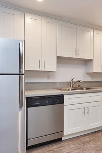 Kitchen with stainless-steel appliances at Ariel Court, Los Angeles, California