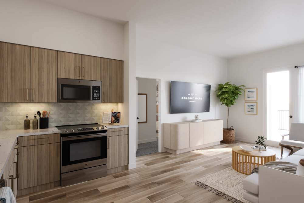 Kitchen with brown cabinets and brown flooring