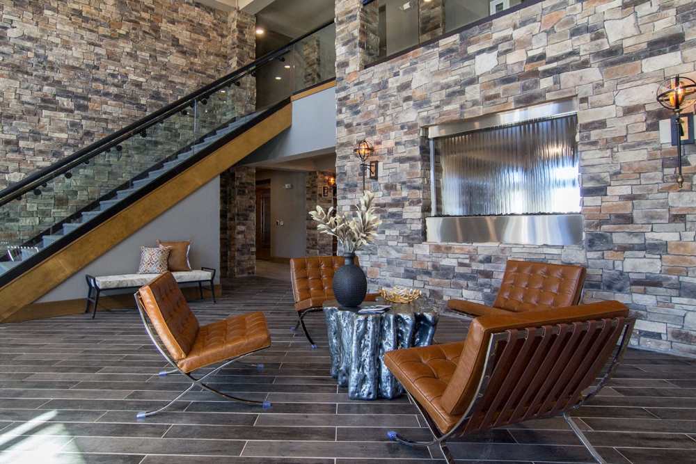 Seating area in clubhouse at Caliber at Hyland Village in Westminster, Colorado