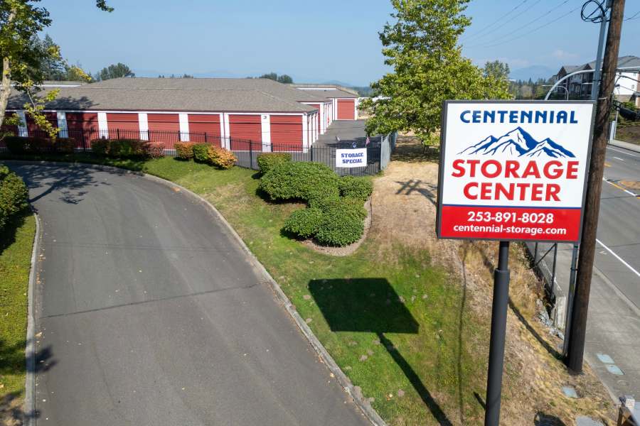 Storage units behind the entrance sign at Centennial Storage in Bonney Lake, Washington