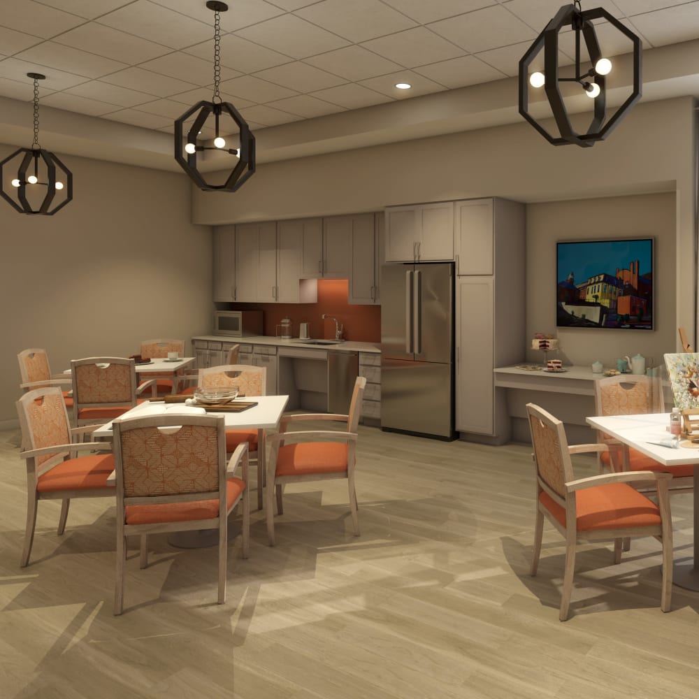 Welcoming activity room with chairs and tables at Anthology of Natick in Natick, Massachusetts