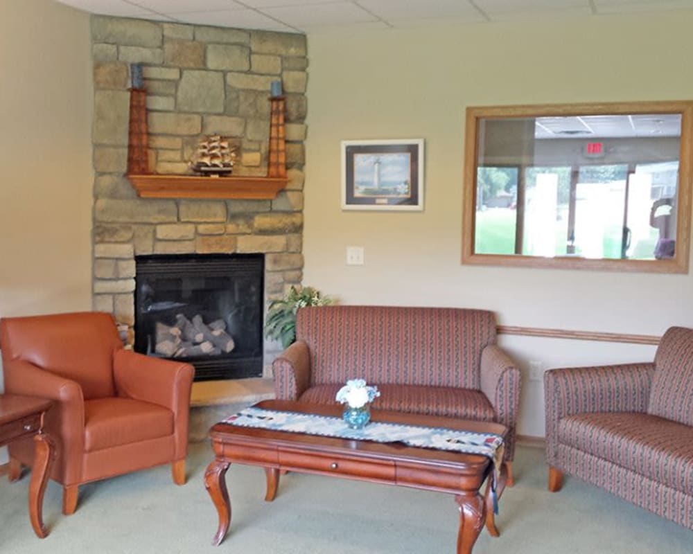 Cozy sitting room with fireplace at Arbor View in Burlington, Wisconsin.