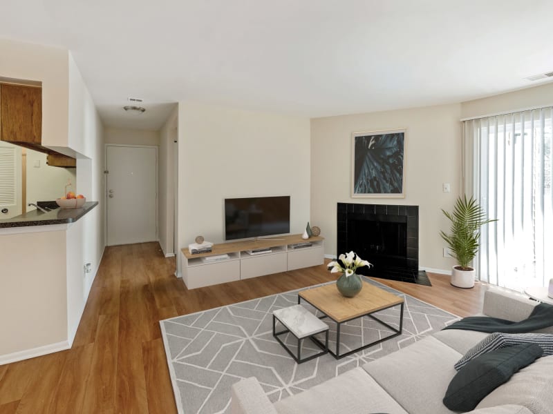 Hardwood flooring in a roomy model apartment living room at Stonecreek Club in Germantown, Maryland