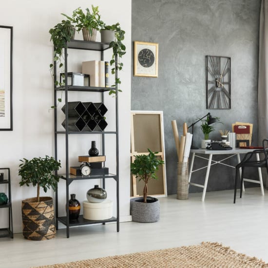 Bookshelf and work area in unit at Westwood Village in Panama City, Florida