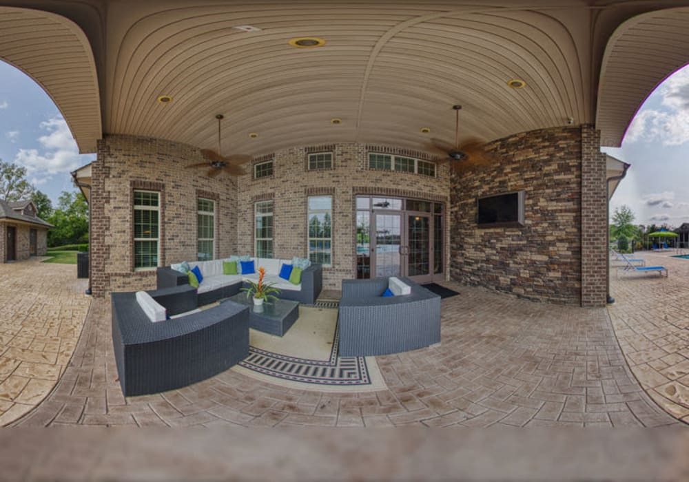 Fishbowl view of community outdoor patio with outdoor lounge furniture, and fireplace at Glass Creek in Mt Juliet, Tennessee