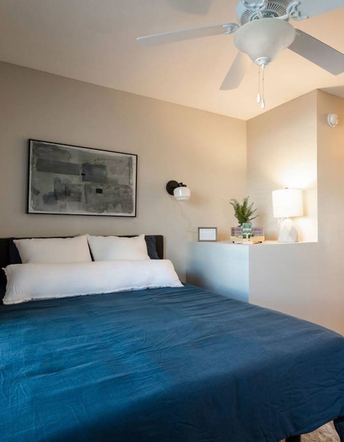 Bedroom with large window at The Wyatt in Lexington, Kentucky