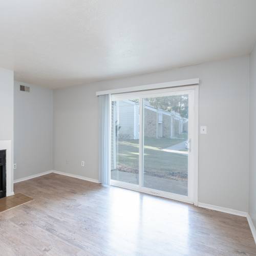 Living room with wooden flooring  at Twyckenham Apartments in Lafayette, Indiana