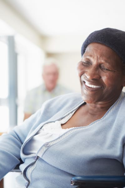 Resident talking to a caretaker at Retirement Center Management in Houston, Texas