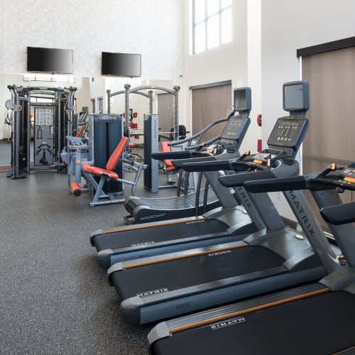 Well-equipped onsite fitness center at Olympus Auburn Lakes in Spring, Texas