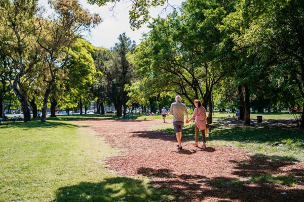 Residents walking in a park near Magnolia Gardens in Brookhaven, Georgia