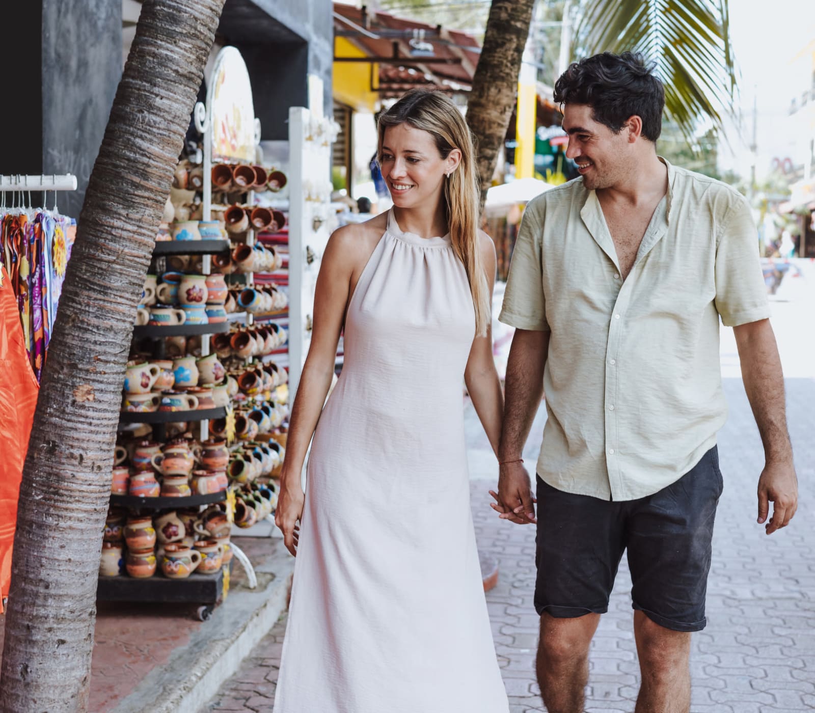 Resident couple enjoying  a walk by the shops near Nine20 Manatee in Bradenton, Florida