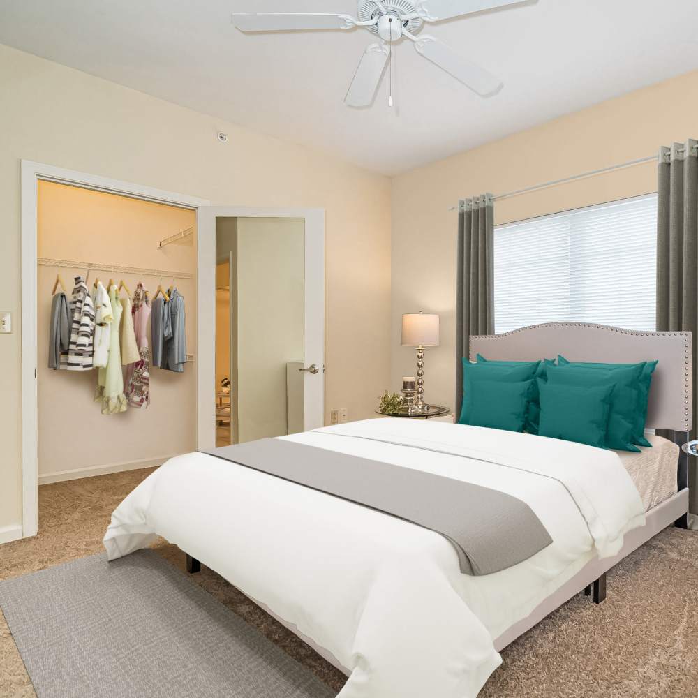 Bedroom with closets at The Boulders At Katy Trail in Saint Charles. MO