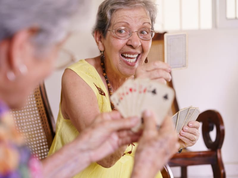 Residents enjoying cards together at The Residences on Forest Lane in Montello, Wisconsin