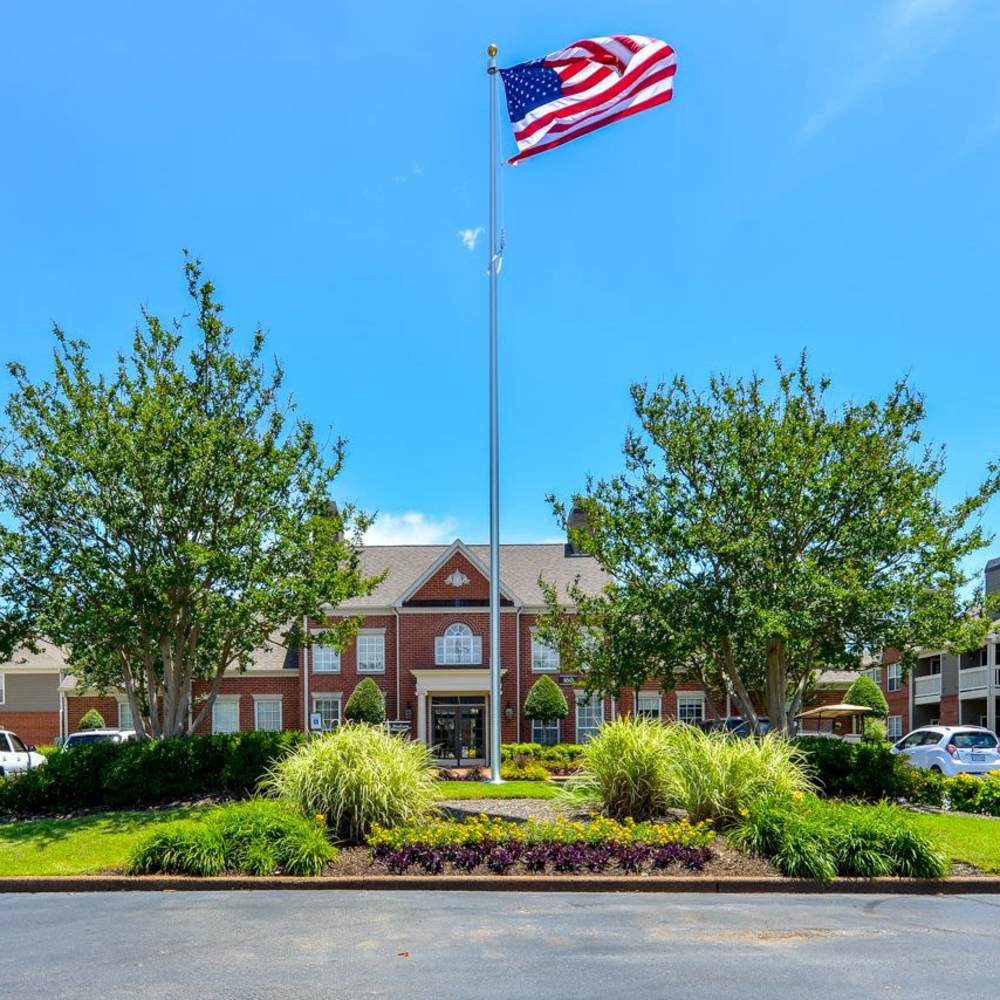 The front exterior of the apartments showcases a welcoming view at Madison at Schilling Farms in Collierville, Tennessee