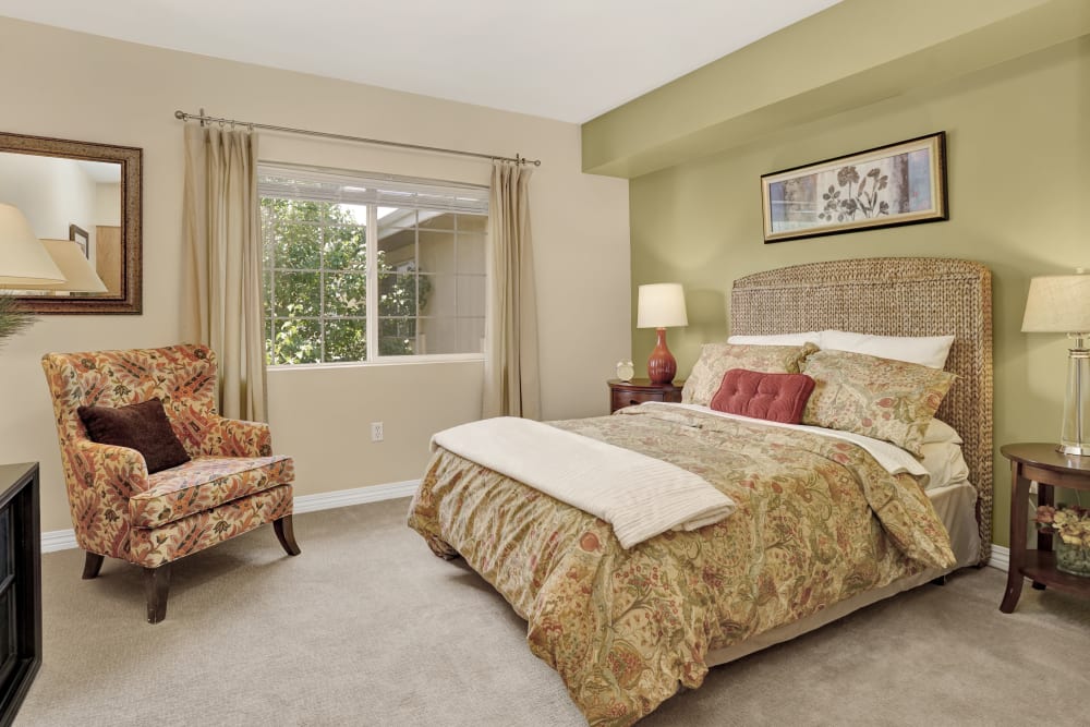 Serene sunny bedroom at Chancellor Gardens in Clearfield, Utah