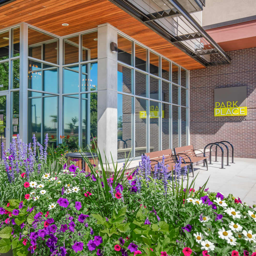 Exterior view of the property with glass window at Park Place Olde Town Apartments in Arvada, Colorado