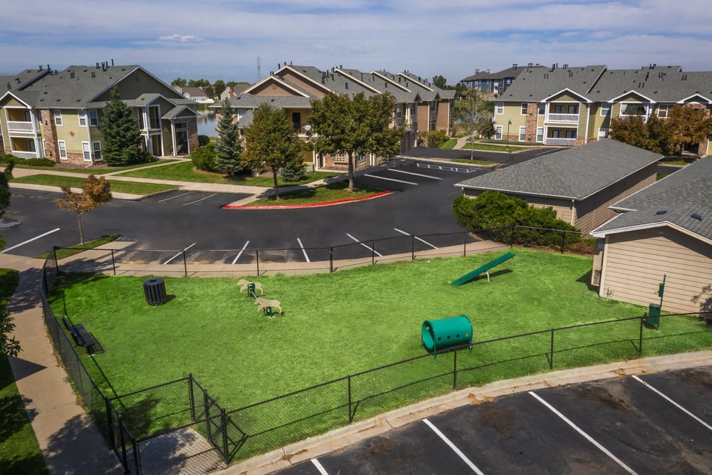 Have fun with your furry friend in the dog park at Gateway Park Apartments in Denver, Colorado
