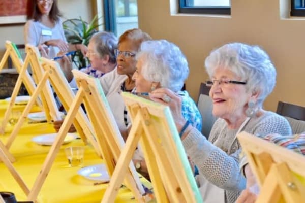 Residents painting at Sunset Lake Village Senior Living in Venice Florida
