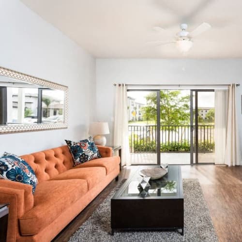Wood-style flooring in a furnished apartment at Channelside in Fort Myers, Florida